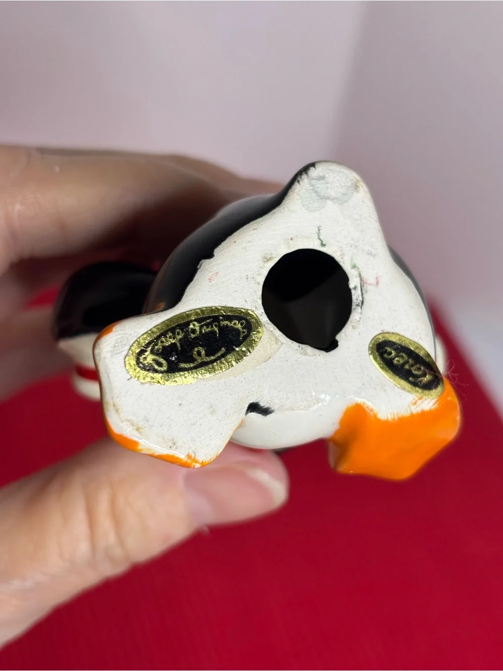 Festive Ceramic Penguin Figurine Holiday Decoration - Black & Orange